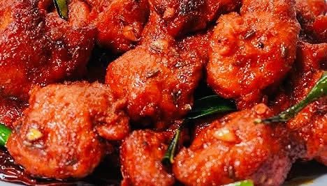 Tandoor Indian Restaurant signature dishes Samosa Chaat
Indian Buffalo Wings
Dal Makhani